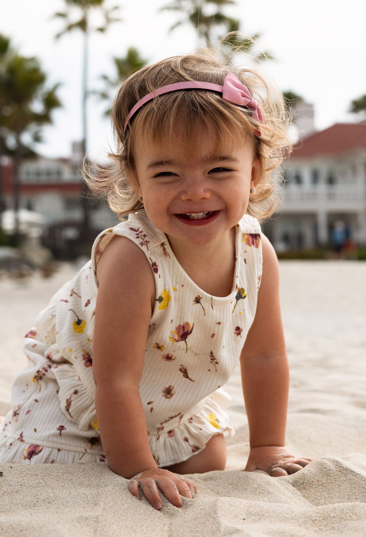 Toddler laughing on Coronado Beach